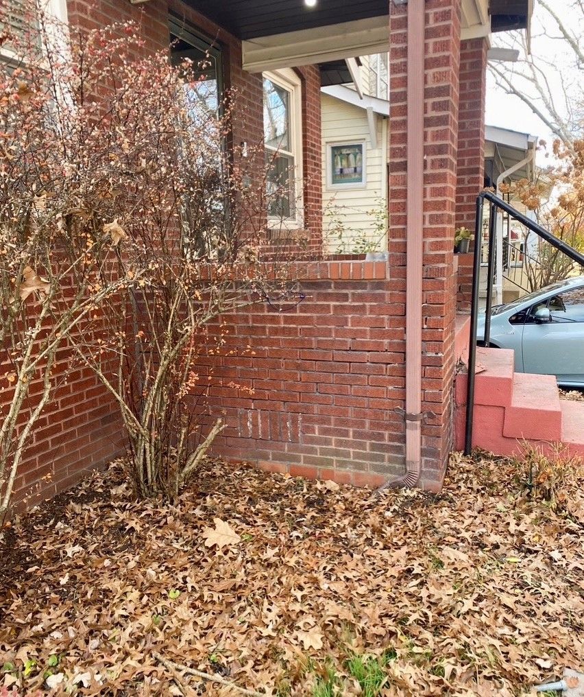 Repaired damaged brickwork in St. Louis for a seamless, finished appearance. - before